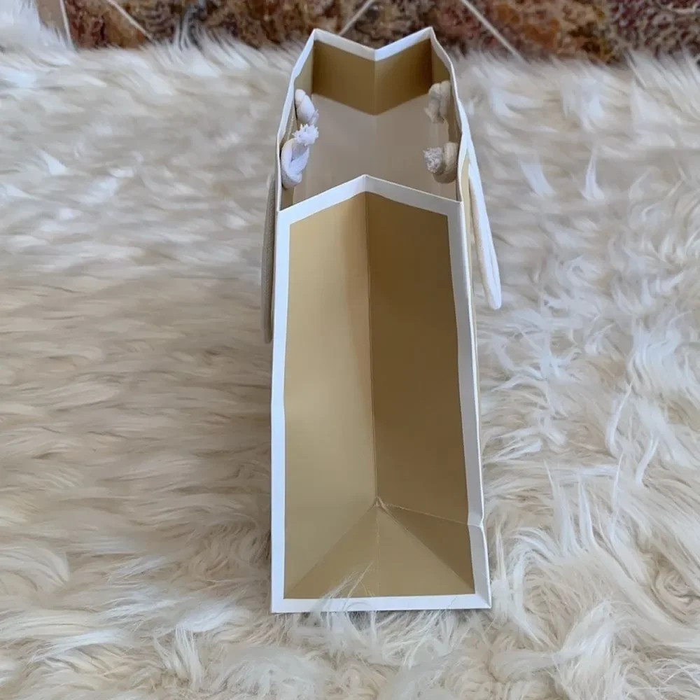 Tan and White Michael Kors Paper Shopping Bag
